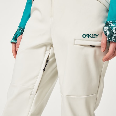 Kalhoty na snowboard Oakley Wms TC Dharma Softshell Bib arctic white 2023 - 9